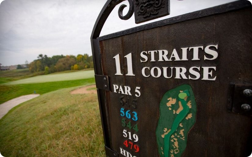 A sign for hole 11 at Whistling Straits golf course.